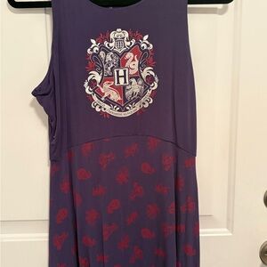 Purple Sleeveless Dress with Red Crest Design